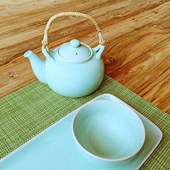Image showing Table setting and blue teapot