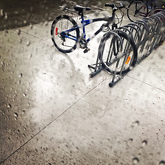 Image showing Bicycles under the rain