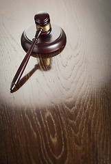 Image showing Wooden Gavel Abstract on Reflective Table