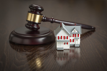 Image showing Gavel and Small Model House on Table