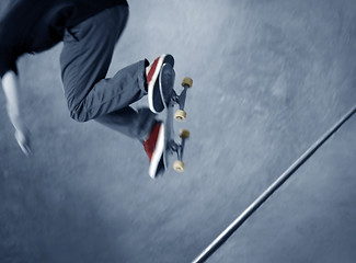 Image showing Skateboarder doing a trick 
