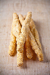 Image showing bread sticks grissini with sesame seeds