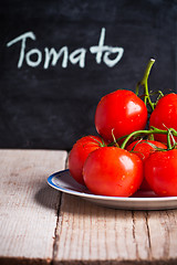 Image showing fresh tomatoes and blackboard