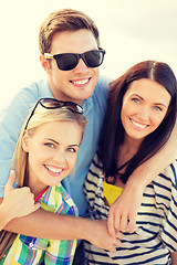 Image showing group of friends having fun on the beach