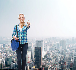 Image showing student with laptop bag showing thumbs up