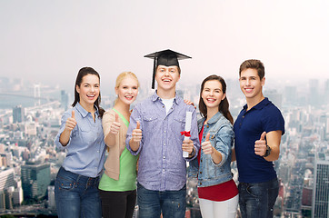 Image showing group of students with diploma showing thumbs up