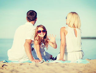 Image showing happy family on the beach