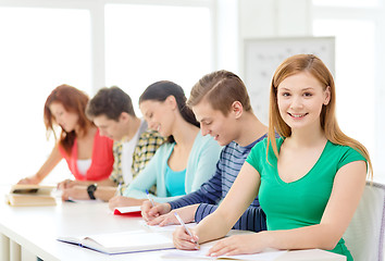 Image showing students with textbooks and books at school