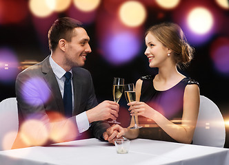 Image showing couple with glasses of champagne at restaurant