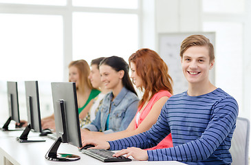 Image showing male student with classmates in computer class