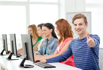 Image showing male student with classmates in computer class