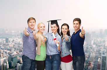 Image showing group of students with diploma showing thumbs up