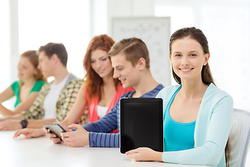 Image showing smiling students with tablet pc at school