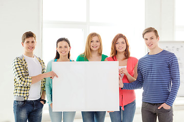 Image showing students at school holding white blank board