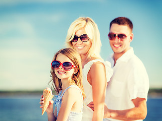 Image showing happy family eating ice cream