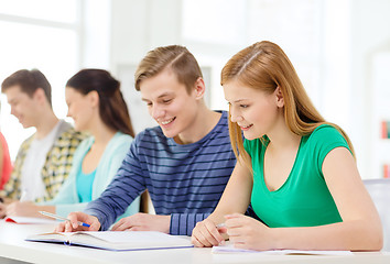 Image showing students with textbooks and books at school