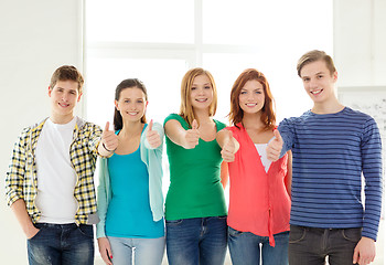 Image showing smiling students at school showing thumbs up