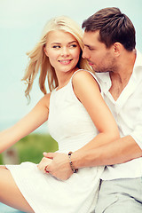 Image showing smiling couple at sea side