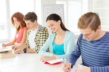 Image showing students with textbooks and books at school