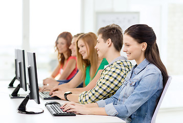 Image showing female student with classmates in computer class