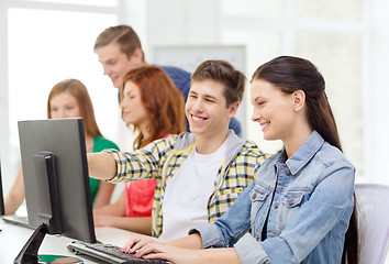 Image showing female student with classmates in computer class