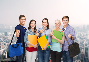 Image showing group of smiling students showing thumbs up