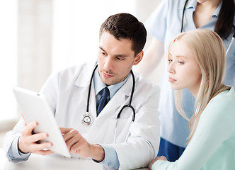 Image showing doctor and nurse with patient in hospital