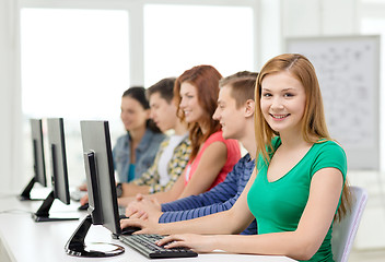 Image showing female student with classmates in computer class