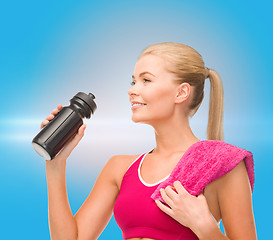 Image showing sporty woman with special sportsman bottle