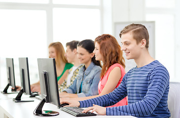 Image showing male student with classmates in computer class