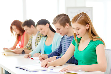 Image showing students with textbooks and books at school