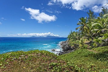 Image showing Rocky shore of tropical volcanic island 