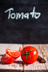 Image showing fresh tomatoes and blackboard 