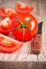 Image showing fresh tomatoes and knife