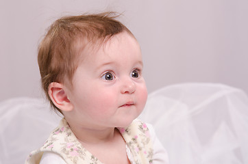 Image showing Portrait of a six-month girl on the couch