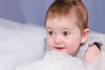 Image showing Baby girl lying in crib