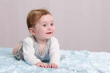 Image showing Six-month girl on the couch