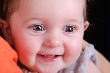 Image showing Portrait of six month baby on mother hands