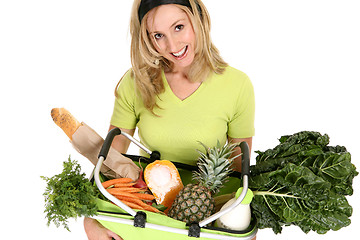 Image showing Female with eco shopping bag filled with groceries