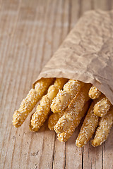 Image showing bread sticks grissini with sesame seeds