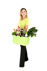 Image showing Eco aware shopper looking sideways