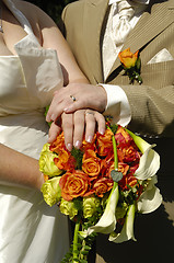 Image showing Wedding hands and flowers