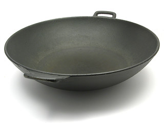 Image showing A big black wok for cooking on white