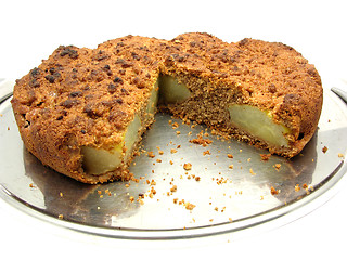 Image showing Sliced wholemeal  pear cake on a cake plate