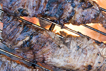 Image showing steak on the grill