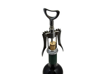 Image showing Red wine and corkscrew