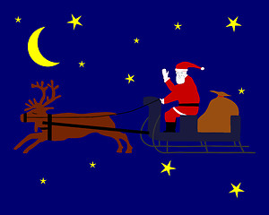 Image showing Santa Claus riding on his reindeersleigh through the christmas night