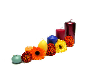 Image showing Six candles arranged with flowers