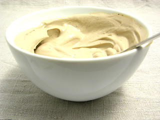 Image showing Quark cheese mixed as dip in a bowl of chinaware on a placemat