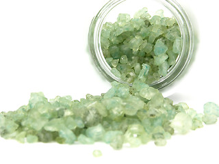 Image showing Green granulate for bathing out of a glass